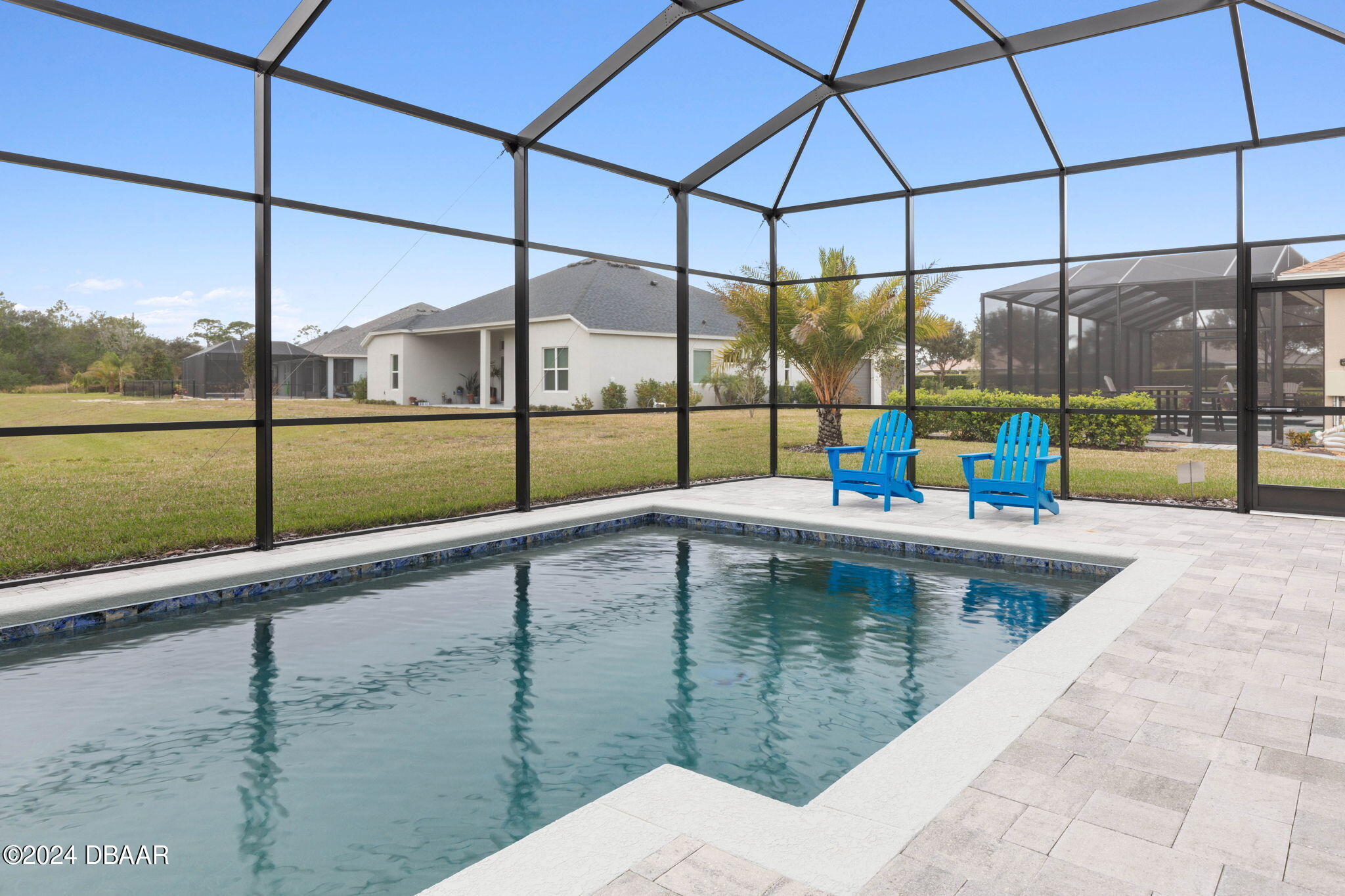 1405 Lilly Anne Circle Ormond Beach, FL 32174 - Photo 27 of 76 a view of a swimming pool with a lounge chairs