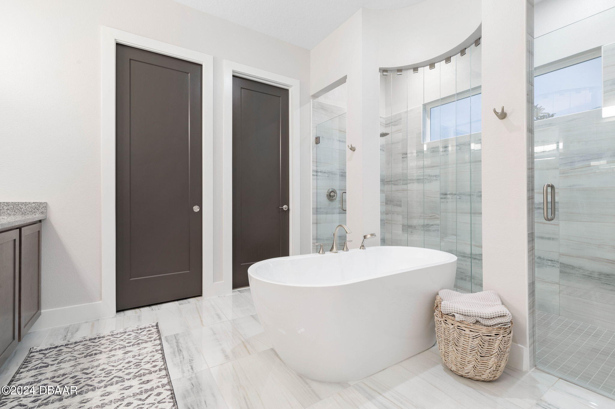 1405 Lilly Anne Circle Ormond Beach, FL 32174 - Photo 39 of 76 a bathroom with a bathtub and a shower