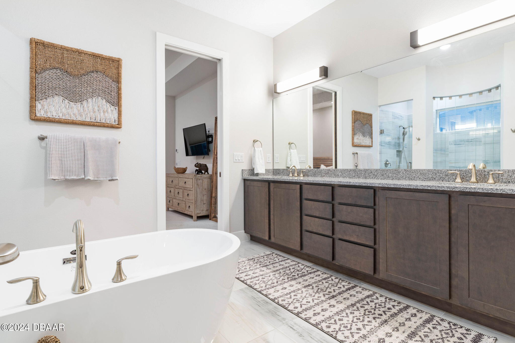 1405 Lilly Anne Circle Ormond Beach, FL 32174 - Photo 41 of 76 a bathroom with a tub a sink and mirror