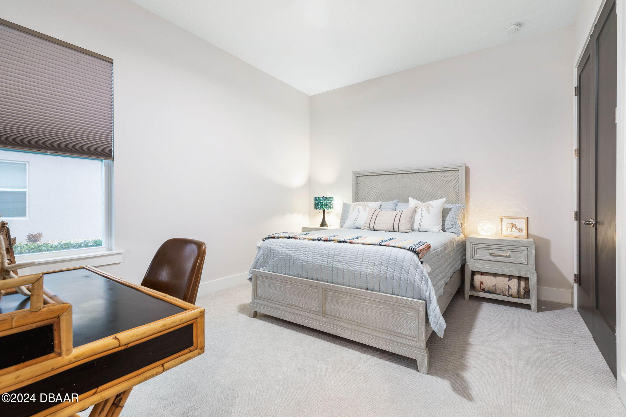 1405 Lilly Anne Circle Ormond Beach, FL 32174 - Photo 45 of 76 a bedroom with a bed and a couch