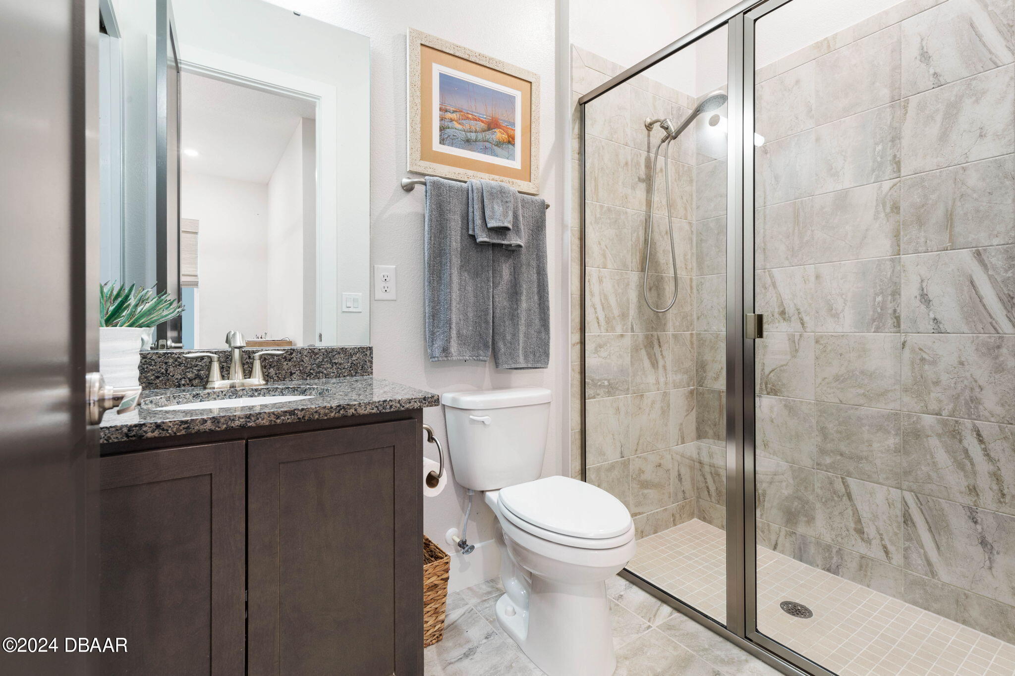 1405 Lilly Anne Circle Ormond Beach, FL 32174 - Photo 47 of 76 a bathroom with a granite countertop sink toilet and shower