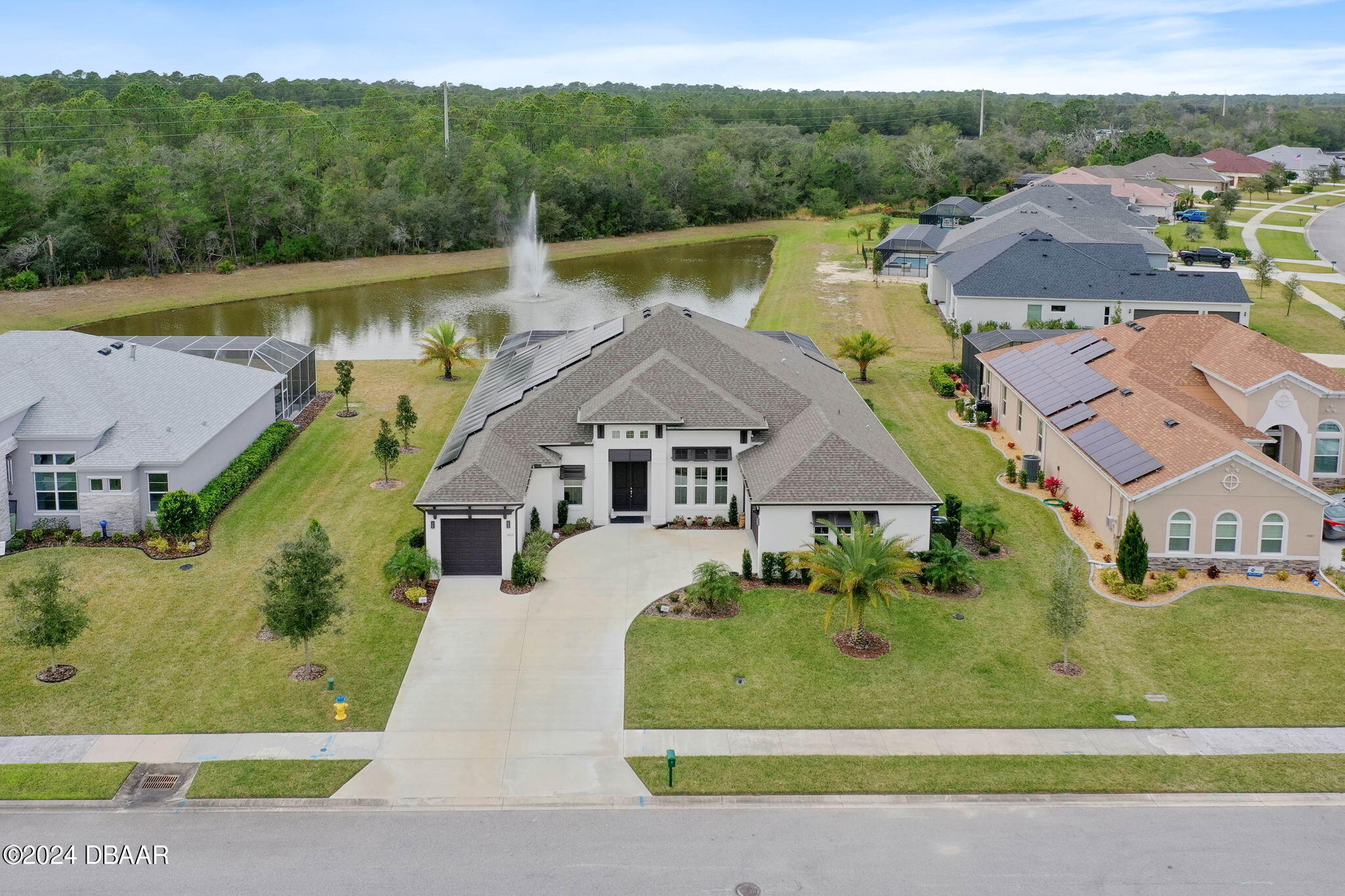 1405 Lilly Anne Circle Ormond Beach, FL 32174 - Photo 58 of 76 an aerial view of a house with a garden