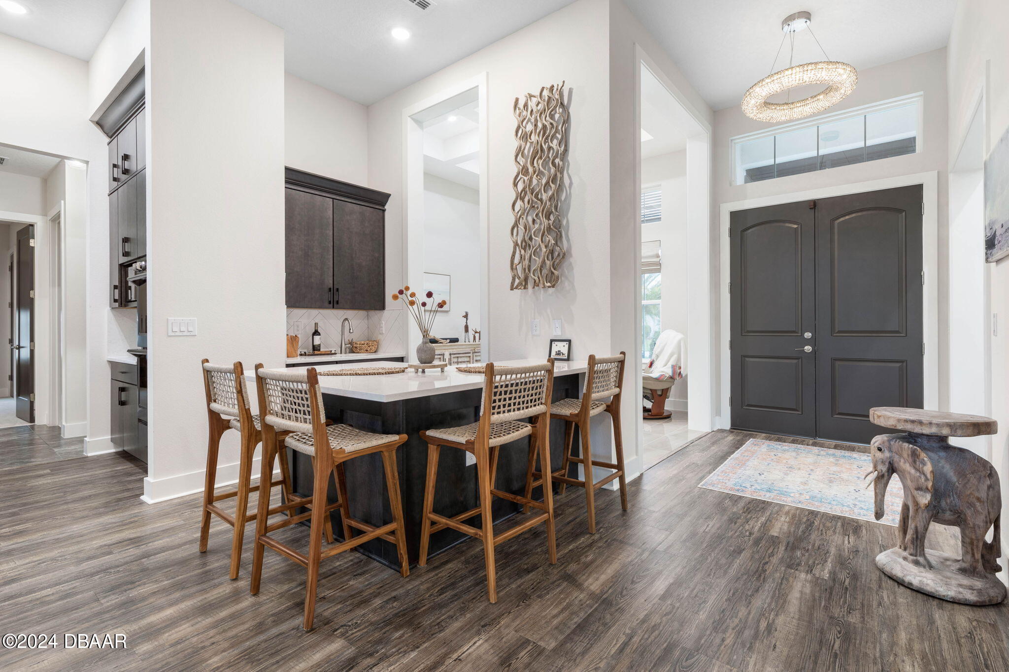1405 Lilly Anne Circle Ormond Beach, FL 32174 - Photo 7 of 76 a view of a dining room with furniture and wooden floor