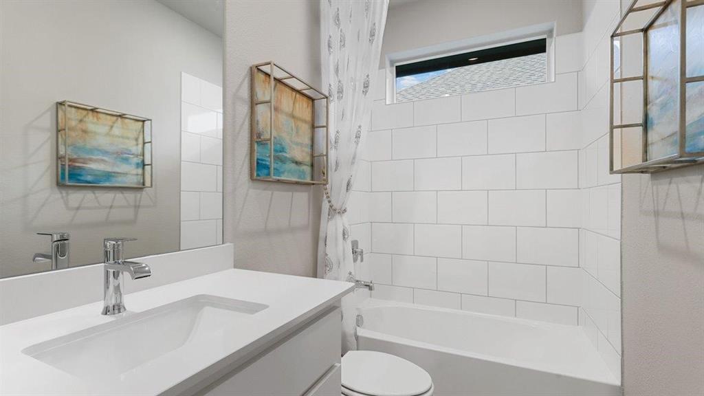 107 Goodnight Court Cleburne, TX 76033 - Photo 24 of 36 a bathroom with a sink toilet and shower