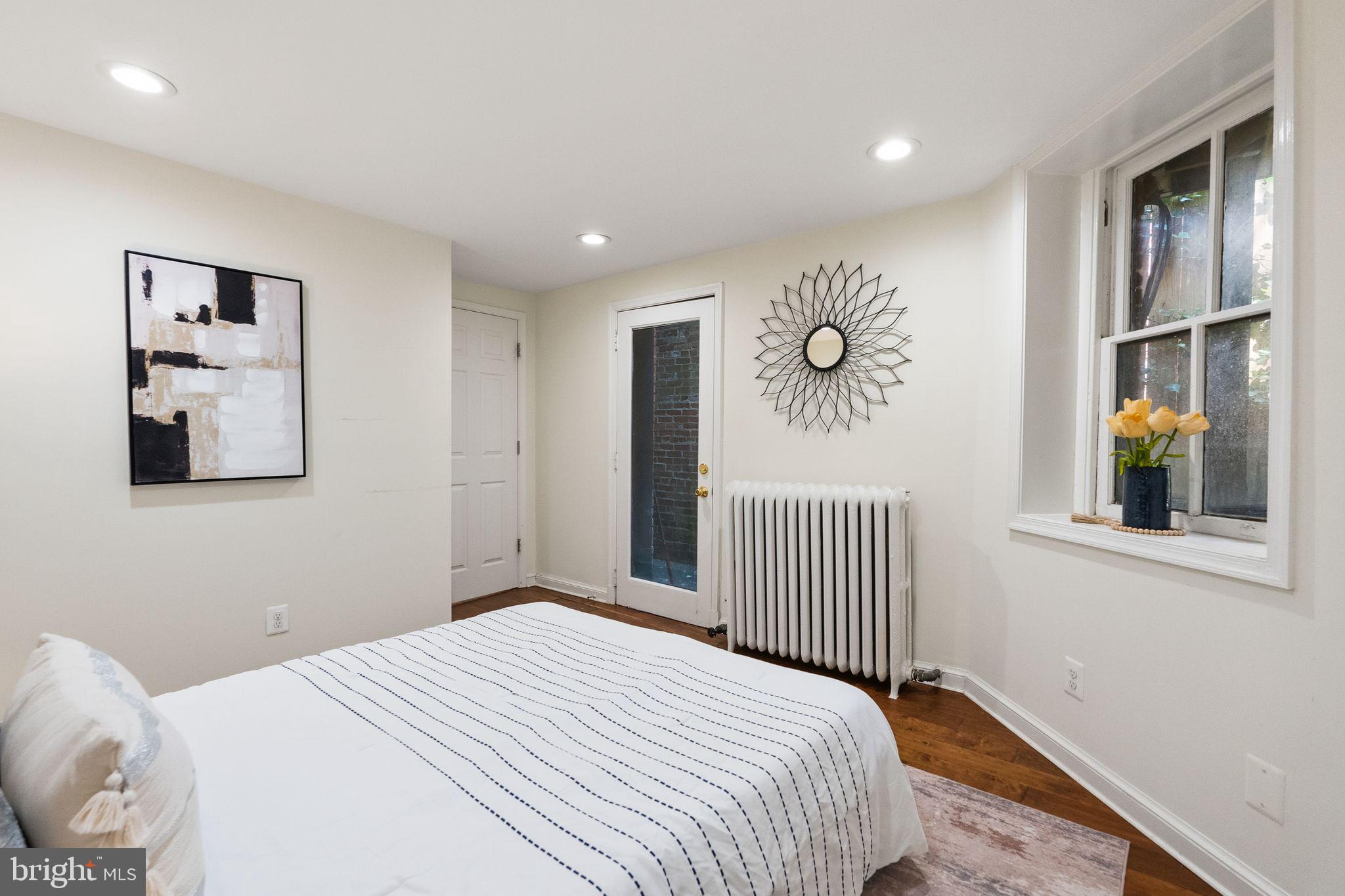 3066 Q Street Northwest Washington, DC 20007 - Photo 52 of 56 Lower Level / Fifth Bedroom With Door to Patio
