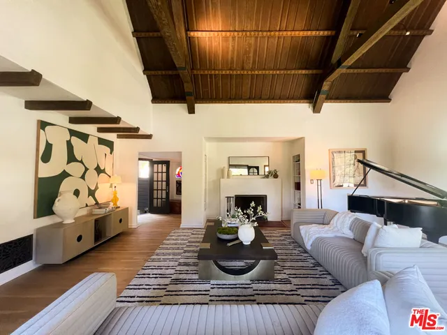 a view of an empty room and glass door