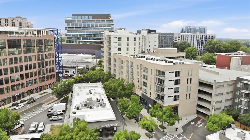 1100 Howell Mill Road Northwest, Unit 608 Atlanta, GA 30318 - Photo 36 of 37 a view of a city with tall buildings