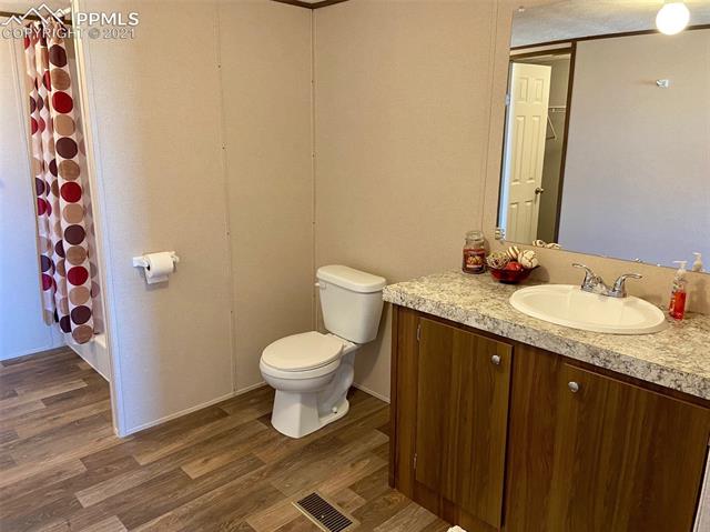 1270 Sengbeil Road Yoder, CO 80864 - Photo 2 of 10 Large master bathroom with attached walk in closet.