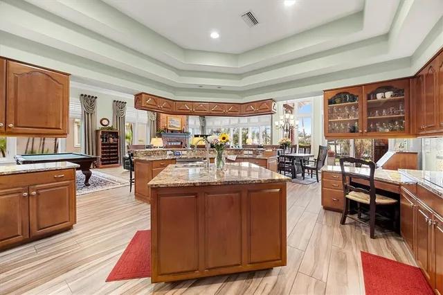 a bedroom with a bed and a desk