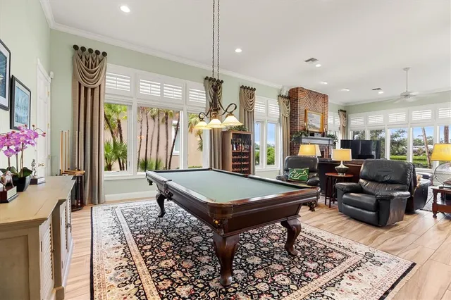 a kitchen with stainless steel appliances a refrigerator sink and cabinets