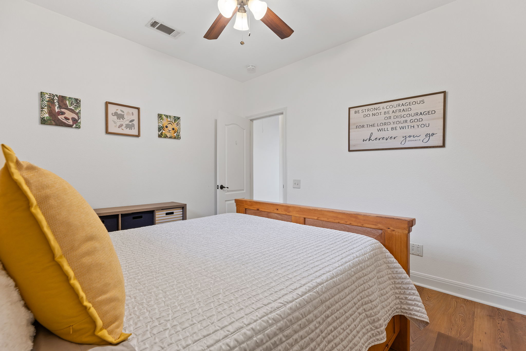 17308 St Therese Road Manor, TX 78653 - Photo 21 of 40 a bedroom with bed and a couch