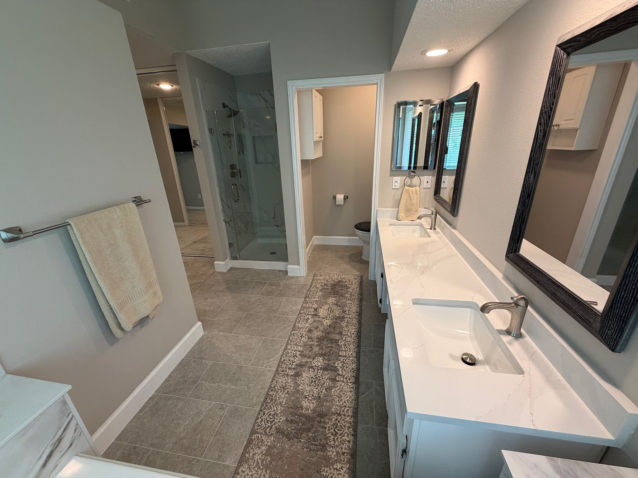 2326 Streamcrest Lane Sugar Land, TX 77479 - Photo 30 of 42 Separate water closet area with window and cabinet.