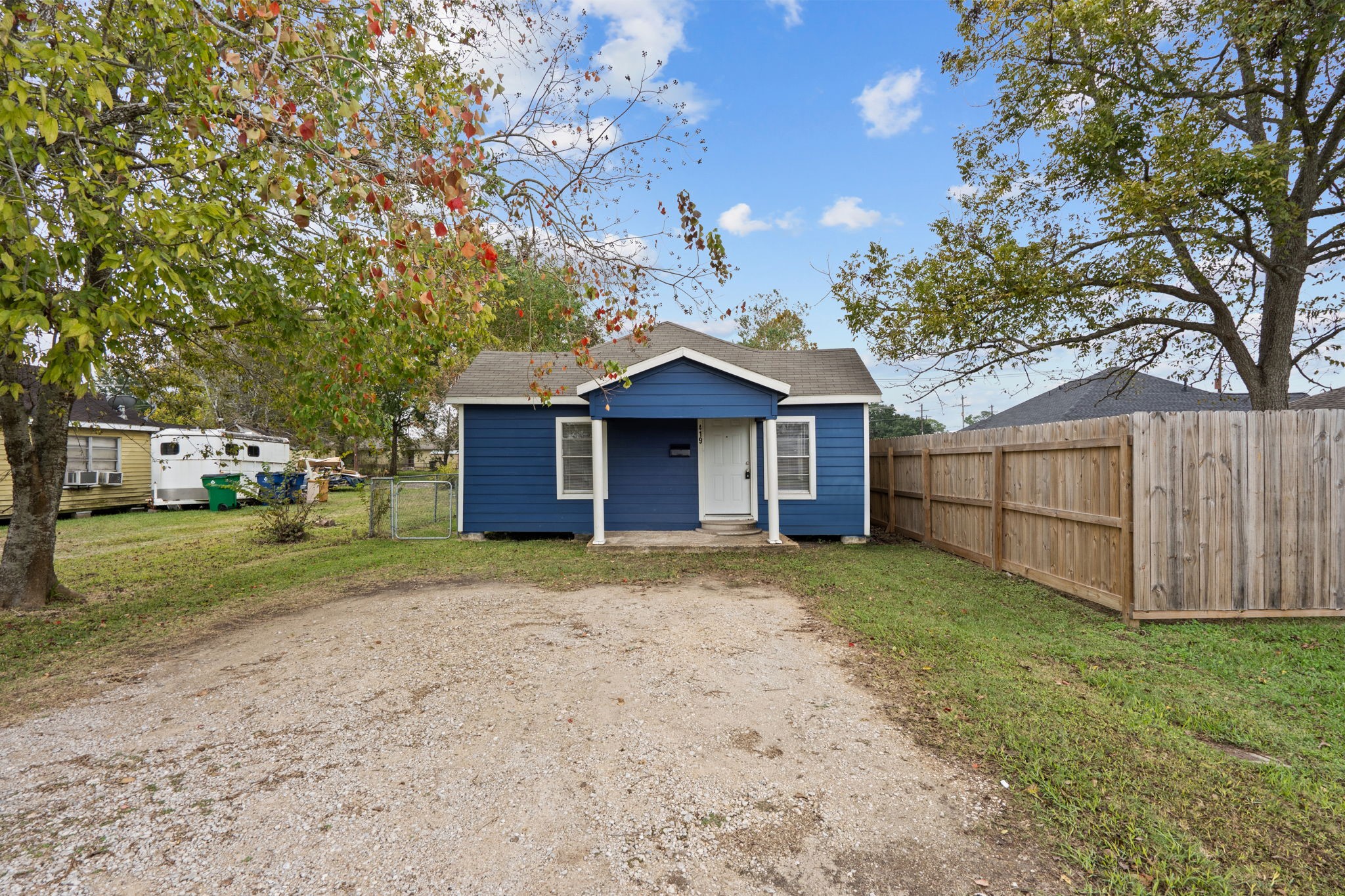 419 North Parrish Street Angleton, TX 77515 - Photo 1 of 25 a view of a house with a yard