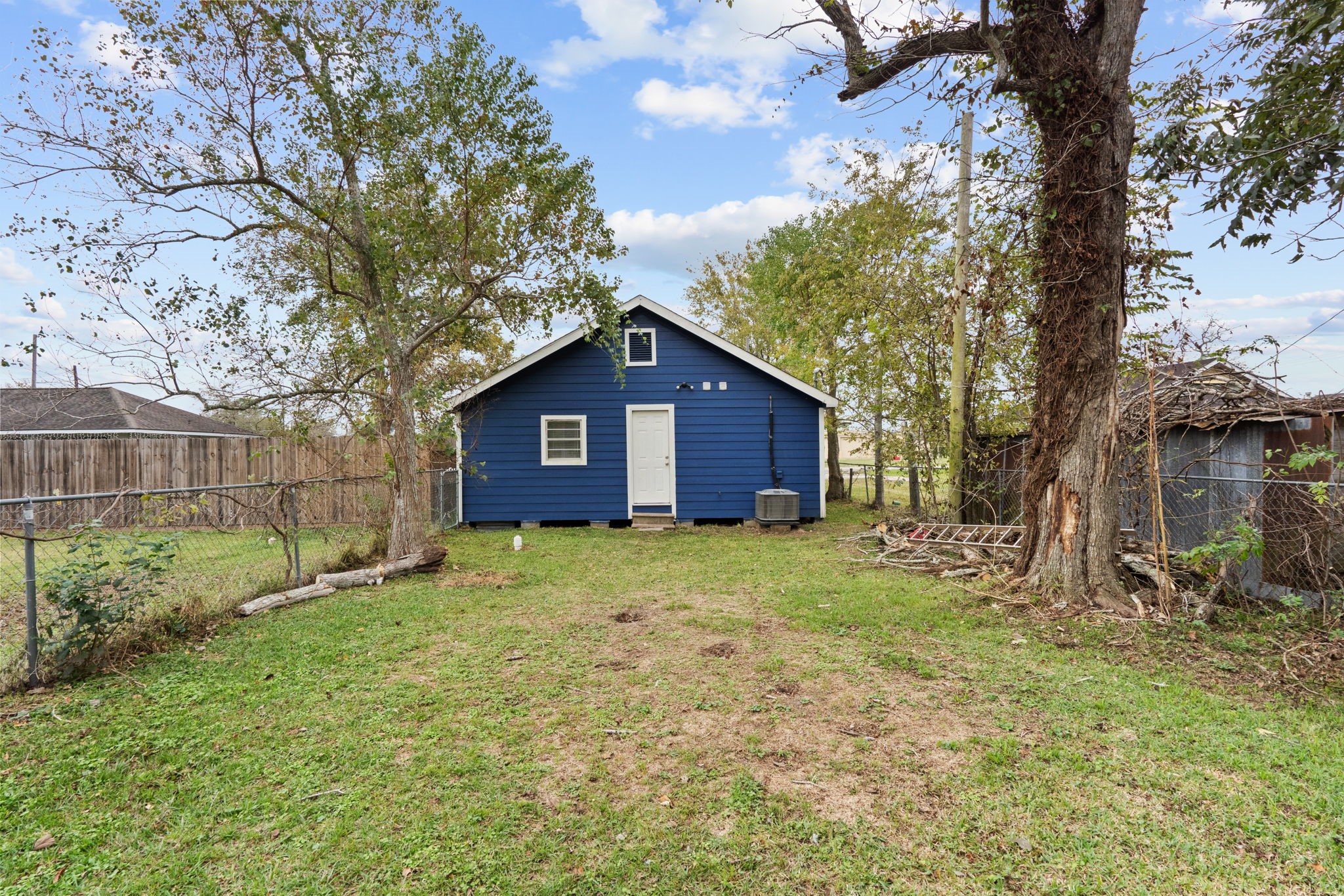 419 North Parrish Street Angleton, TX 77515 - Photo 24 of 25 a view of a house with a yard