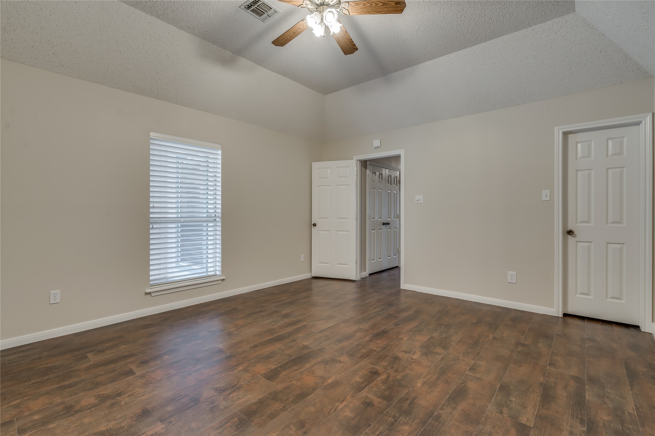 2460 Pebblebrook Circle Conroe, TX 77384 - Photo 16 of 27 Alternate view of primary bedroom, including the large walk-in closet