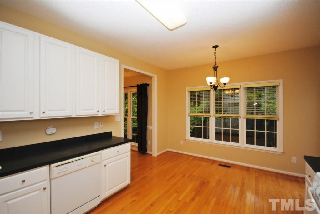 6915 Brigmore Court Raleigh, NC 27617 - Photo 13 of 25 a view of an empty room with a window