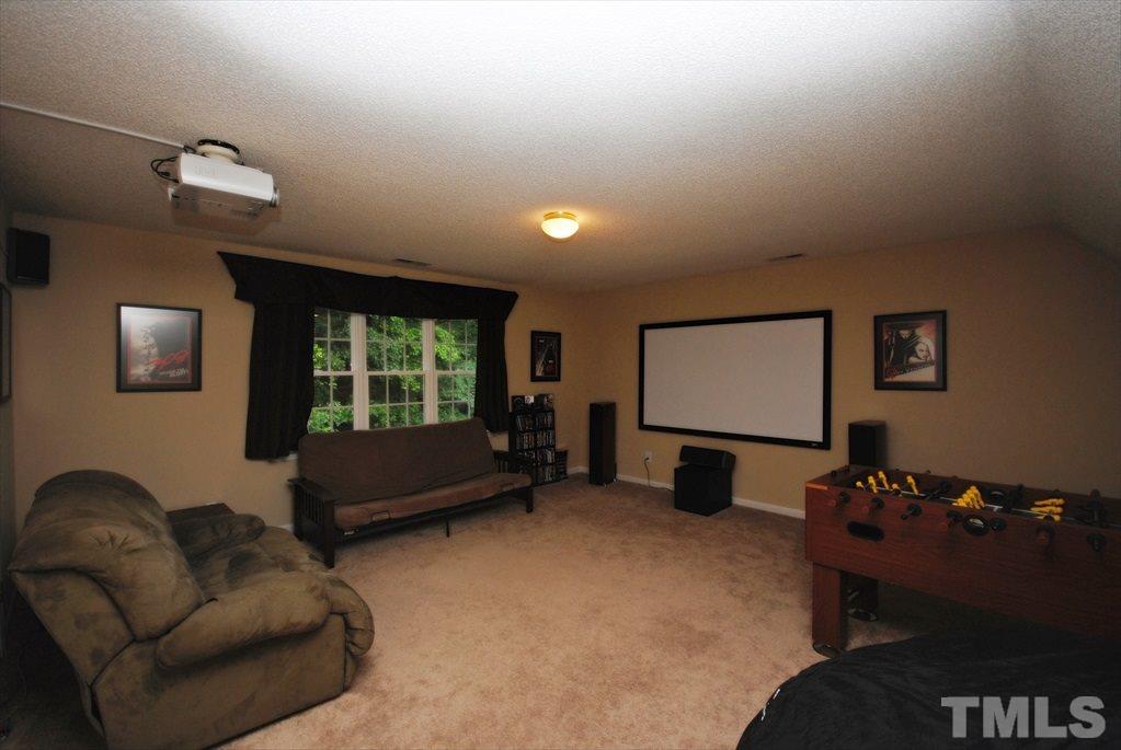 6915 Brigmore Court Raleigh, NC 27617 - Photo 14 of 25 a living room with furniture