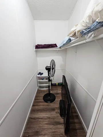 a bathroom with a sink a toilet and a shower