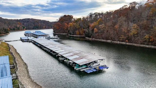 an aerial view of a house with outdoor space