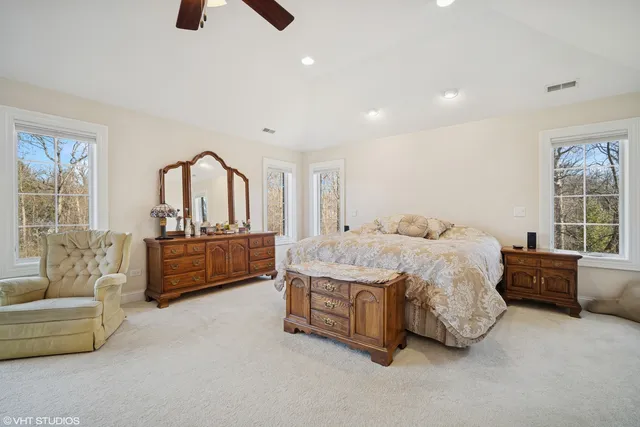 a bed room with a bed and a couch