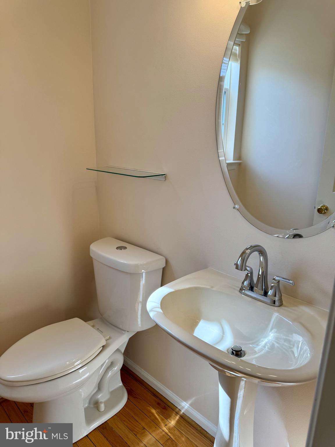 4 Hogan Circle Middletown, DE 19709 - Photo 11 of 60 a bathroom with a sink and a mirror