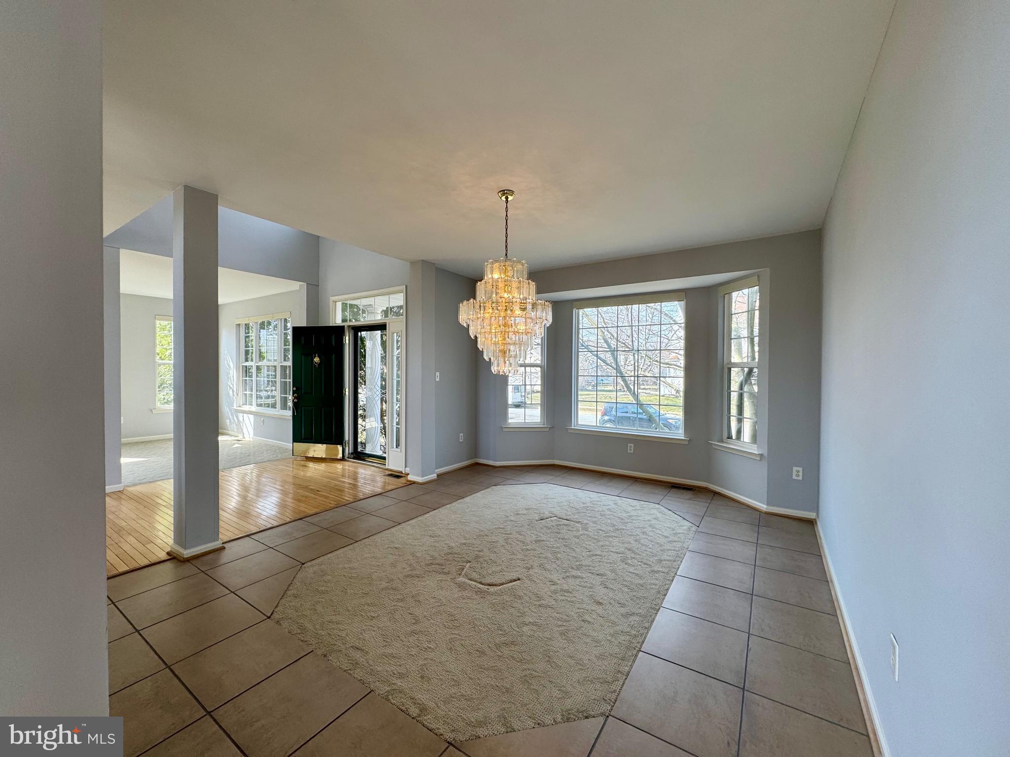 4 Hogan Circle Middletown, DE 19709 - Photo 15 of 60 a view of an empty room with window and chandelier