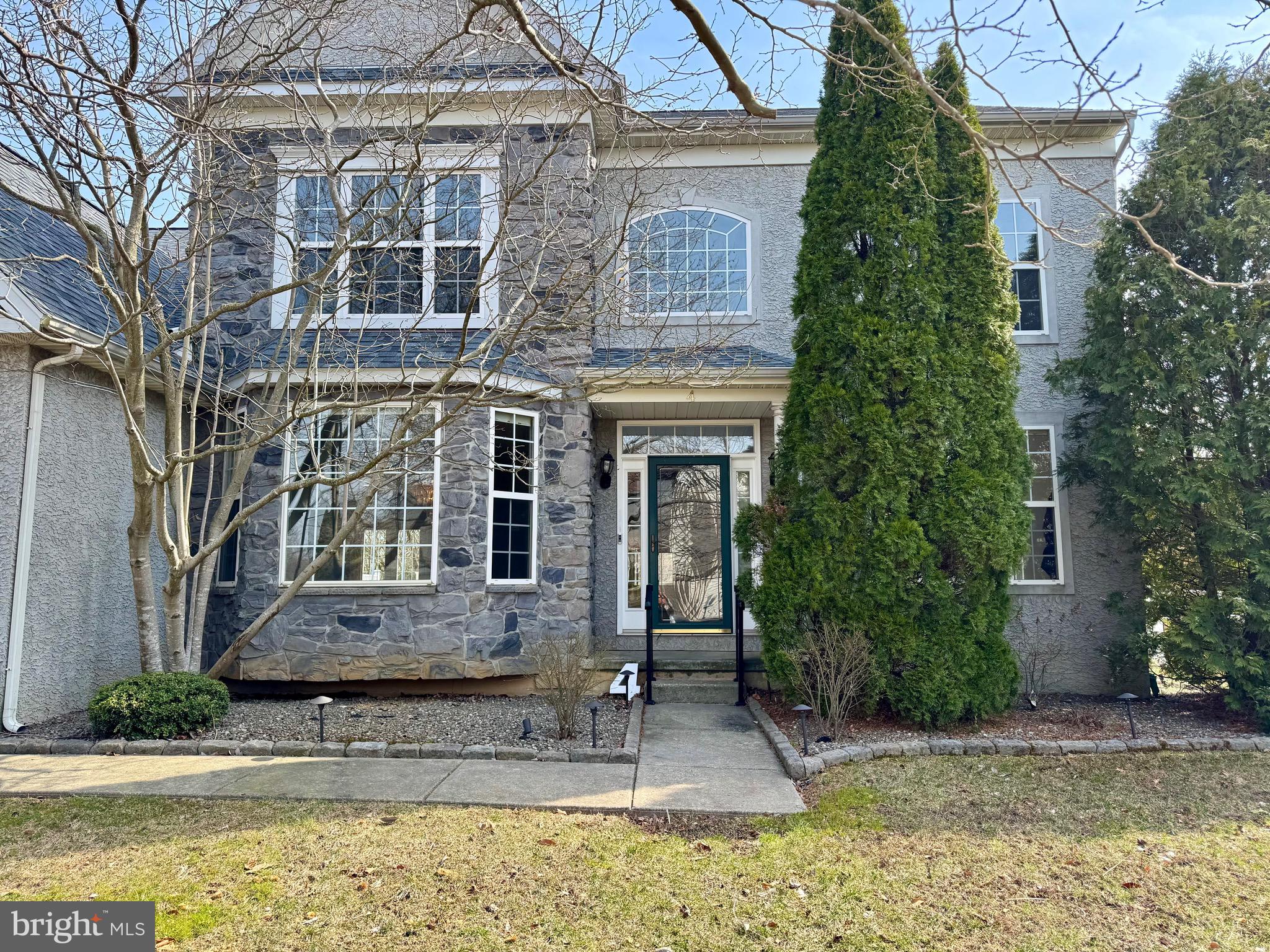 4 Hogan Circle Middletown, DE 19709 - Photo 3 of 60 a front view of a building with garden