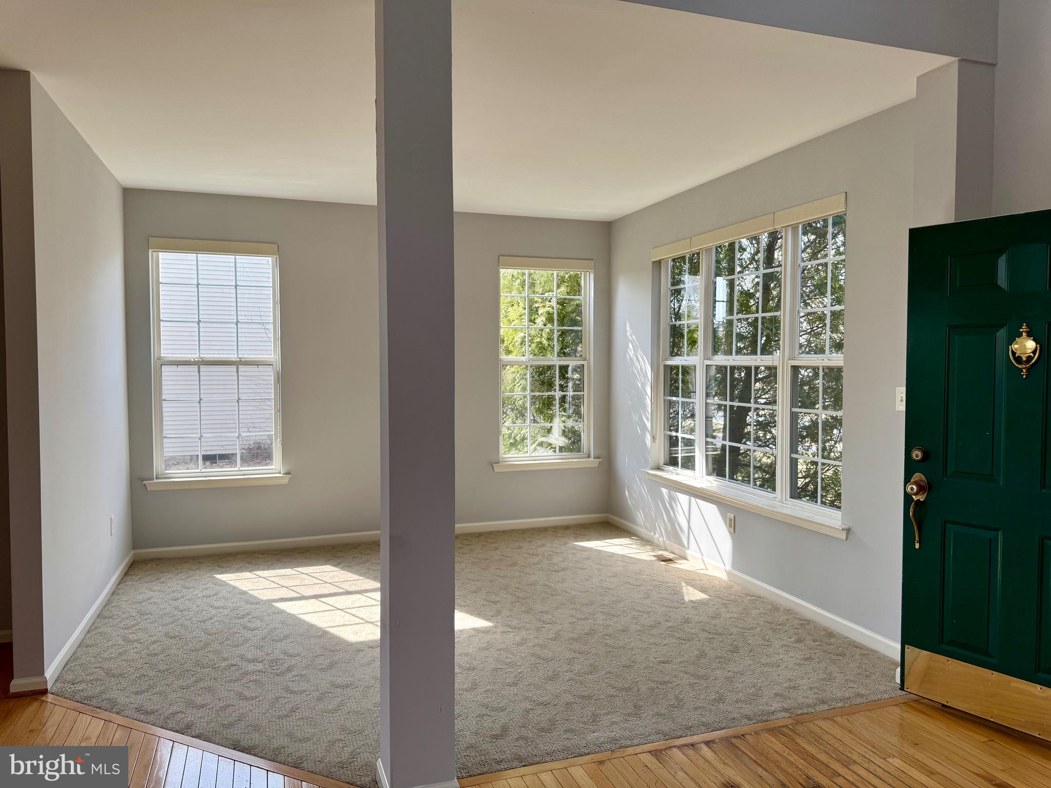 4 Hogan Circle Middletown, DE 19709 - Photo 4 of 60 an empty room with windows