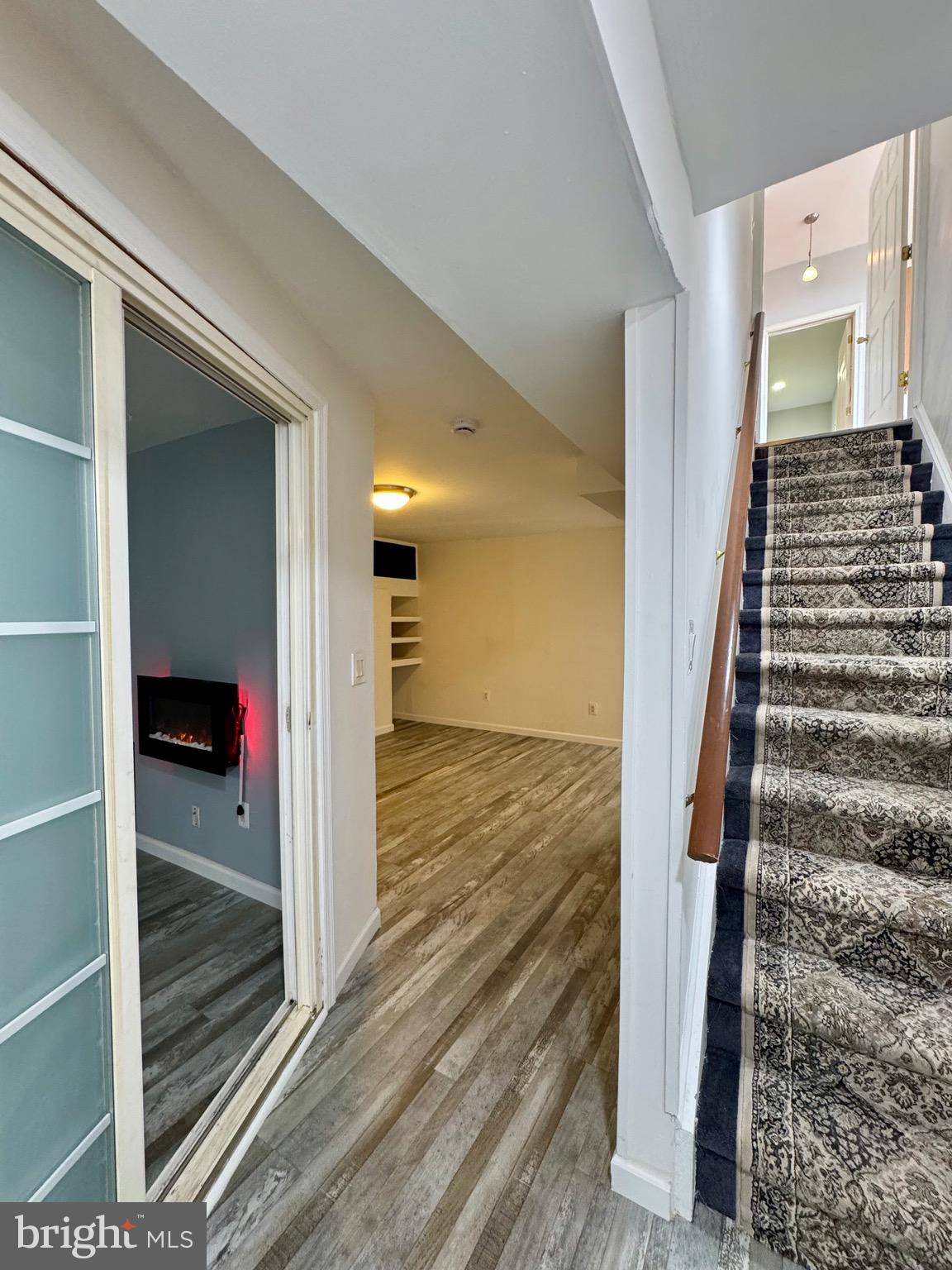 4 Hogan Circle Middletown, DE 19709 - Photo 45 of 60 a view of a hallway view with wooden floor and staircase