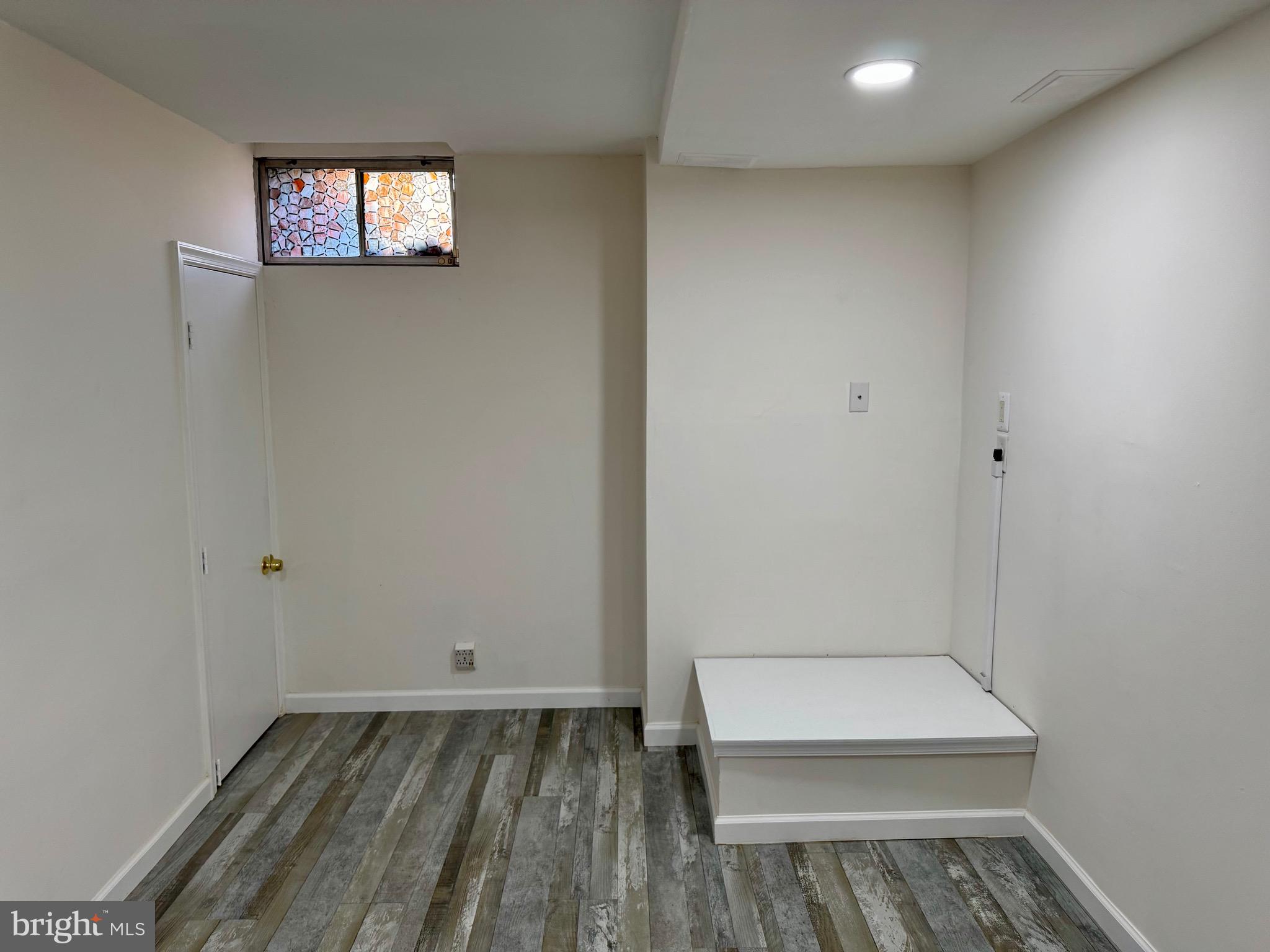 4 Hogan Circle Middletown, DE 19709 - Photo 55 of 60 a view of a small space with wooden floor and white walls