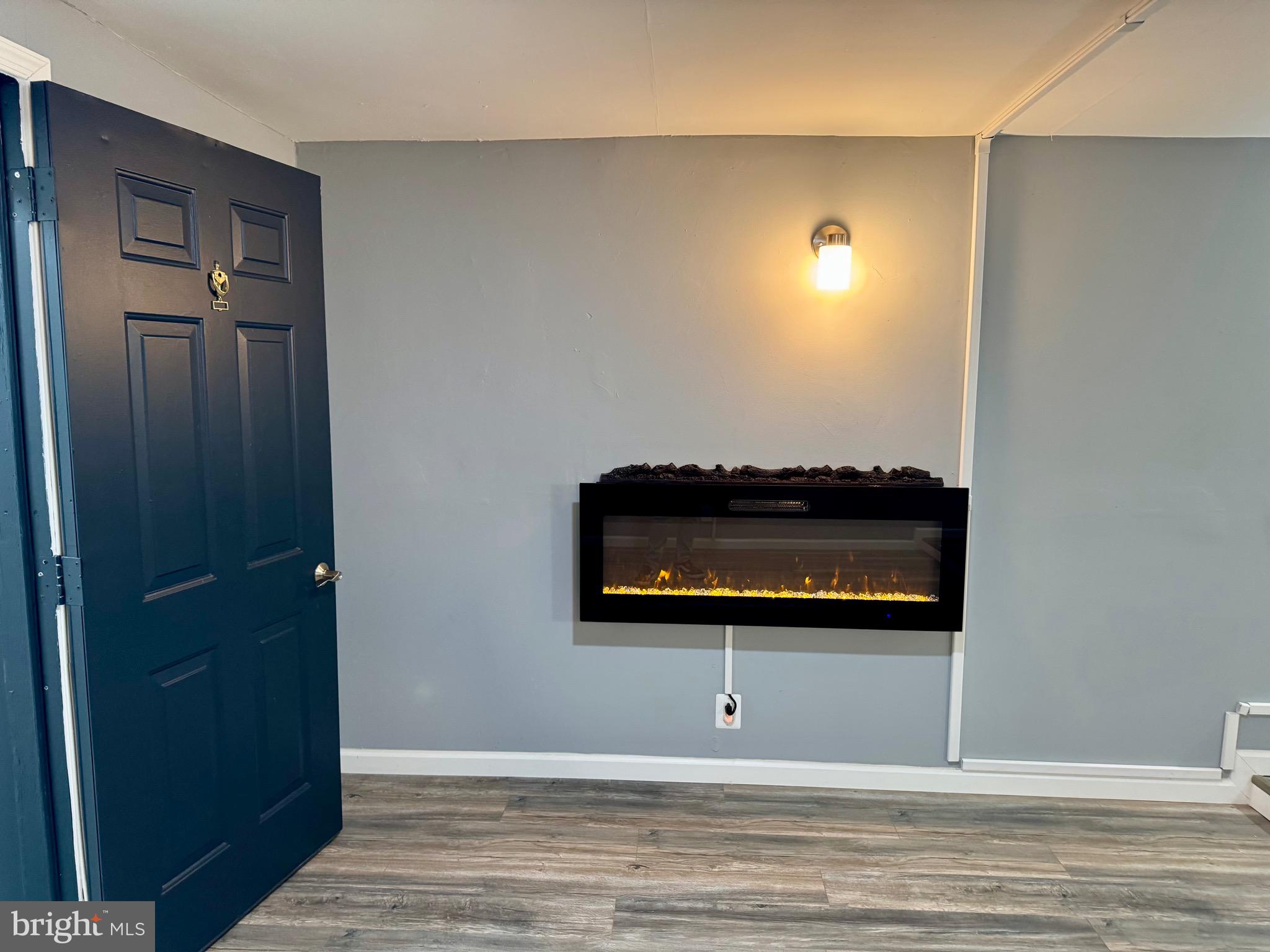 4 Hogan Circle Middletown, DE 19709 - Photo 58 of 60 a view of a hallway with wooden floor and staircase