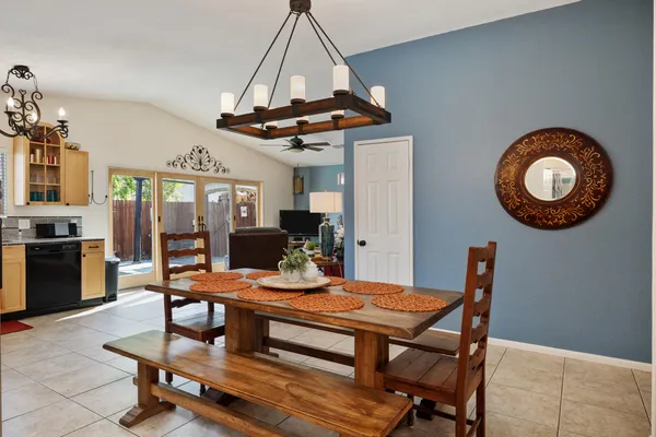 a outdoor space with a table and chairs