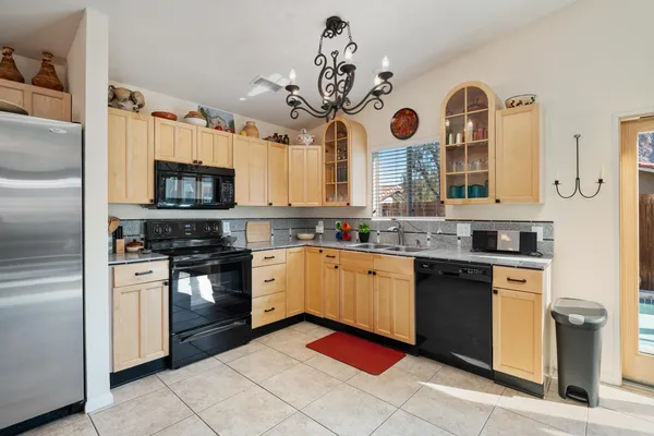 a kitchen with a sink and a window