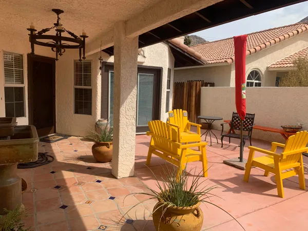 a building outdoor space with patio furniture