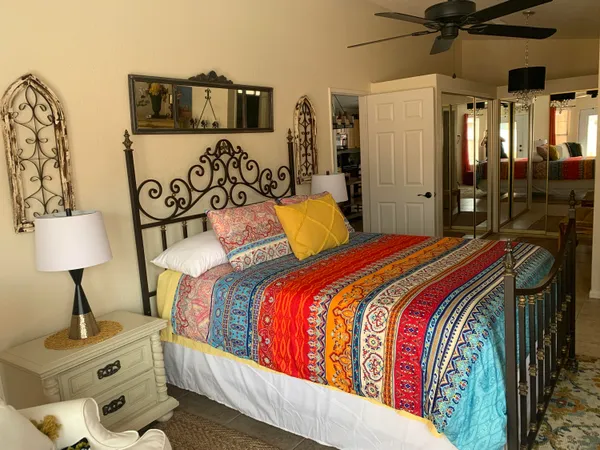 a bathroom with a toilet a sink and a mirror