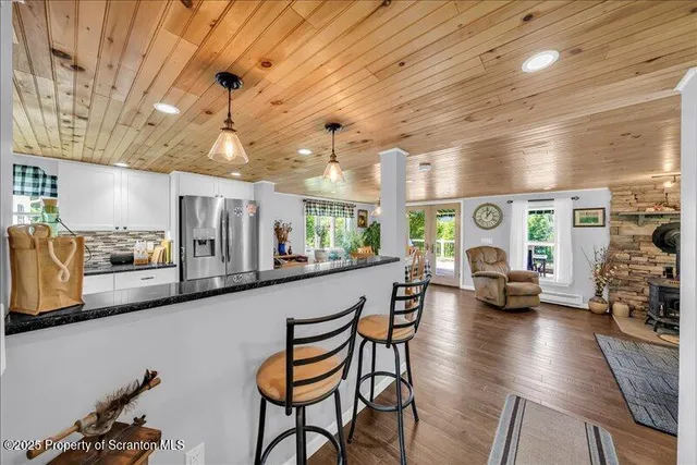 a very nice looking kitchen with a large window