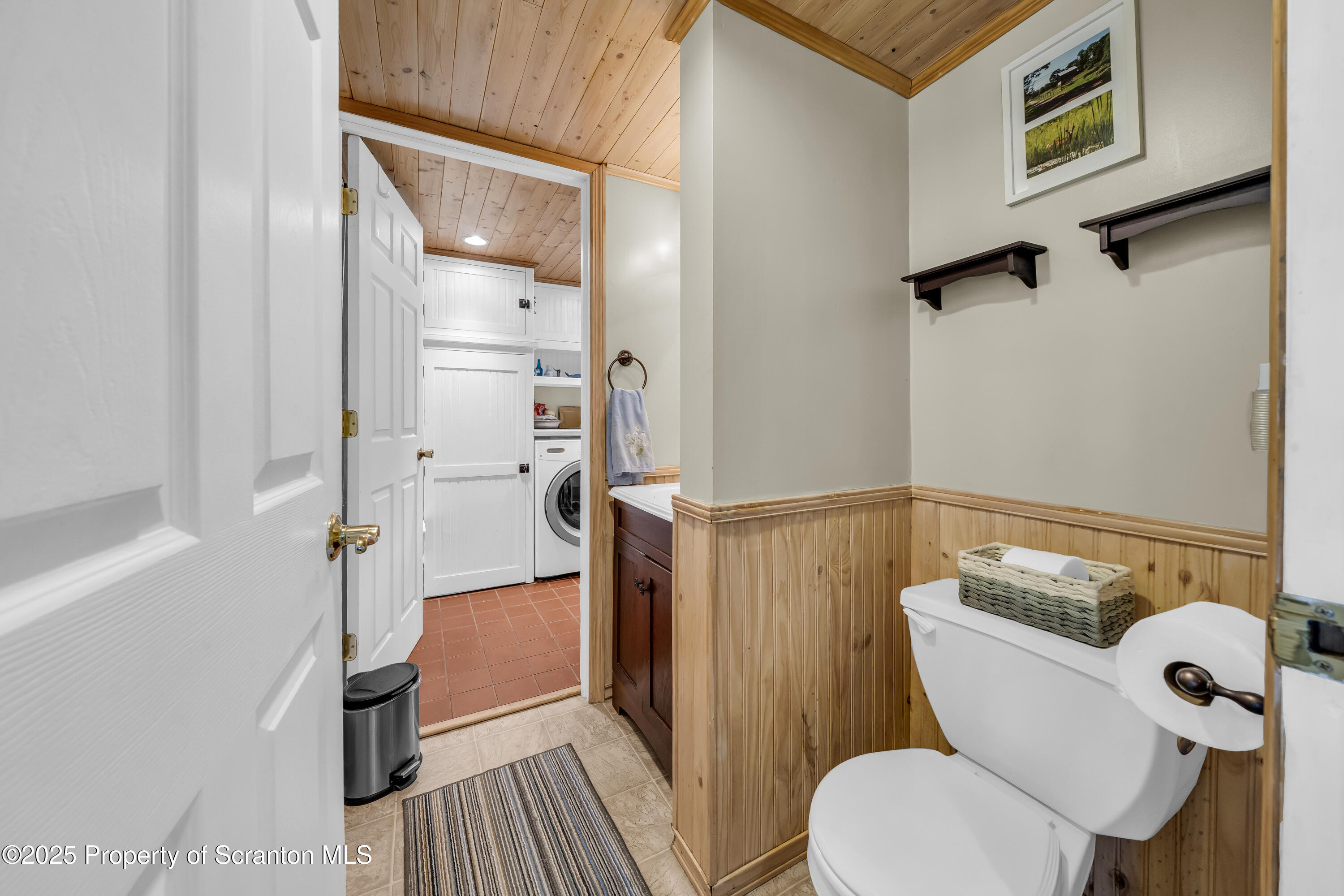 1715 Booth Road Hallstead, PA 18822 - Photo 14 of 39 a bathroom with a toilet and a shower