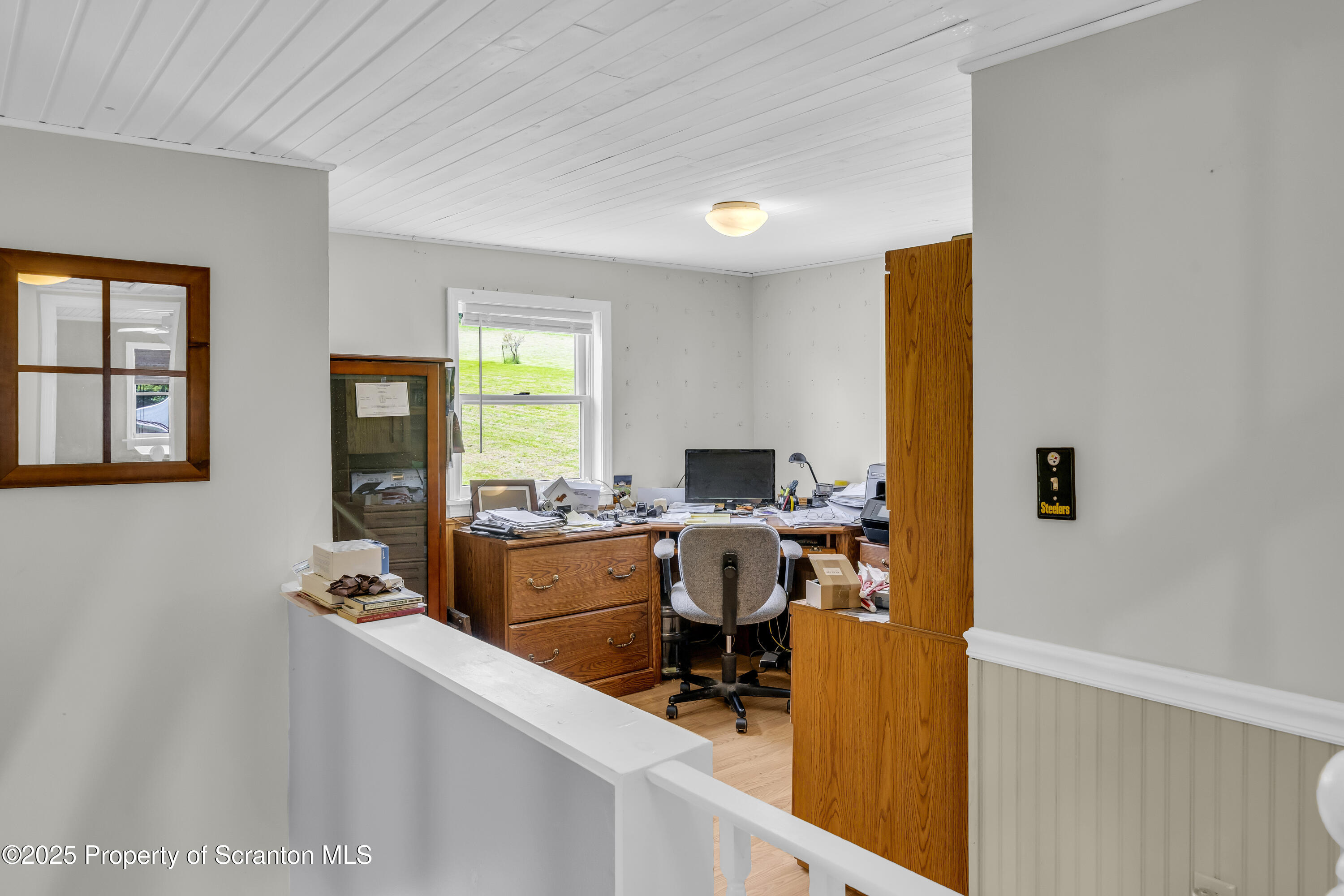 1715 Booth Road Hallstead, PA 18822 - Photo 19 of 39 a view of a workspace with kitchen area