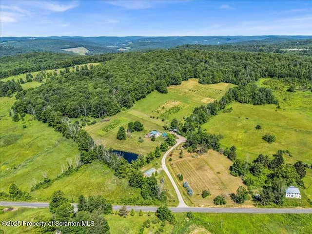 a view of a lake with a yard