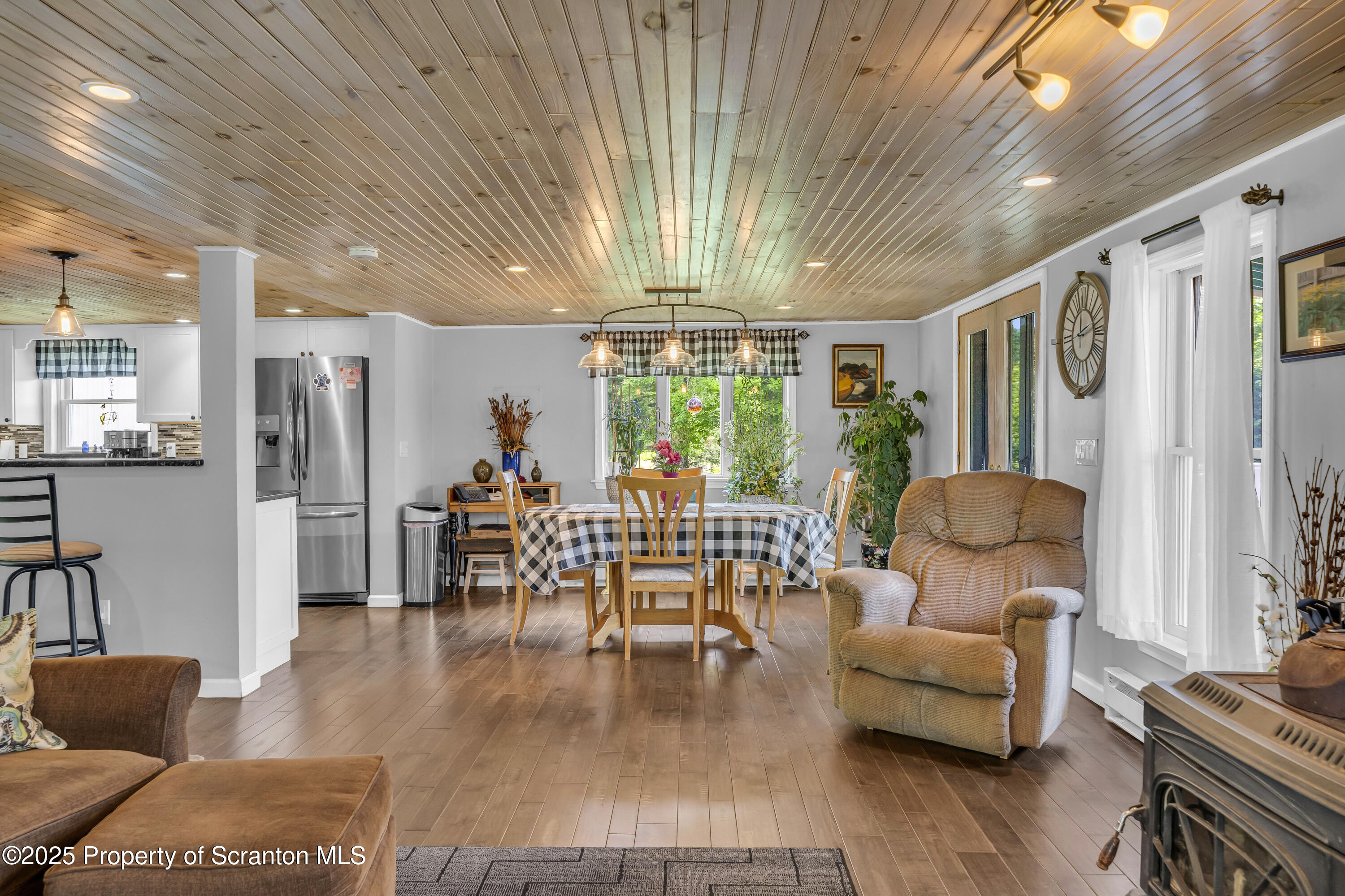 1715 Booth Road Hallstead, PA 18822 - Photo 6 of 39 a living room with furniture and a large window