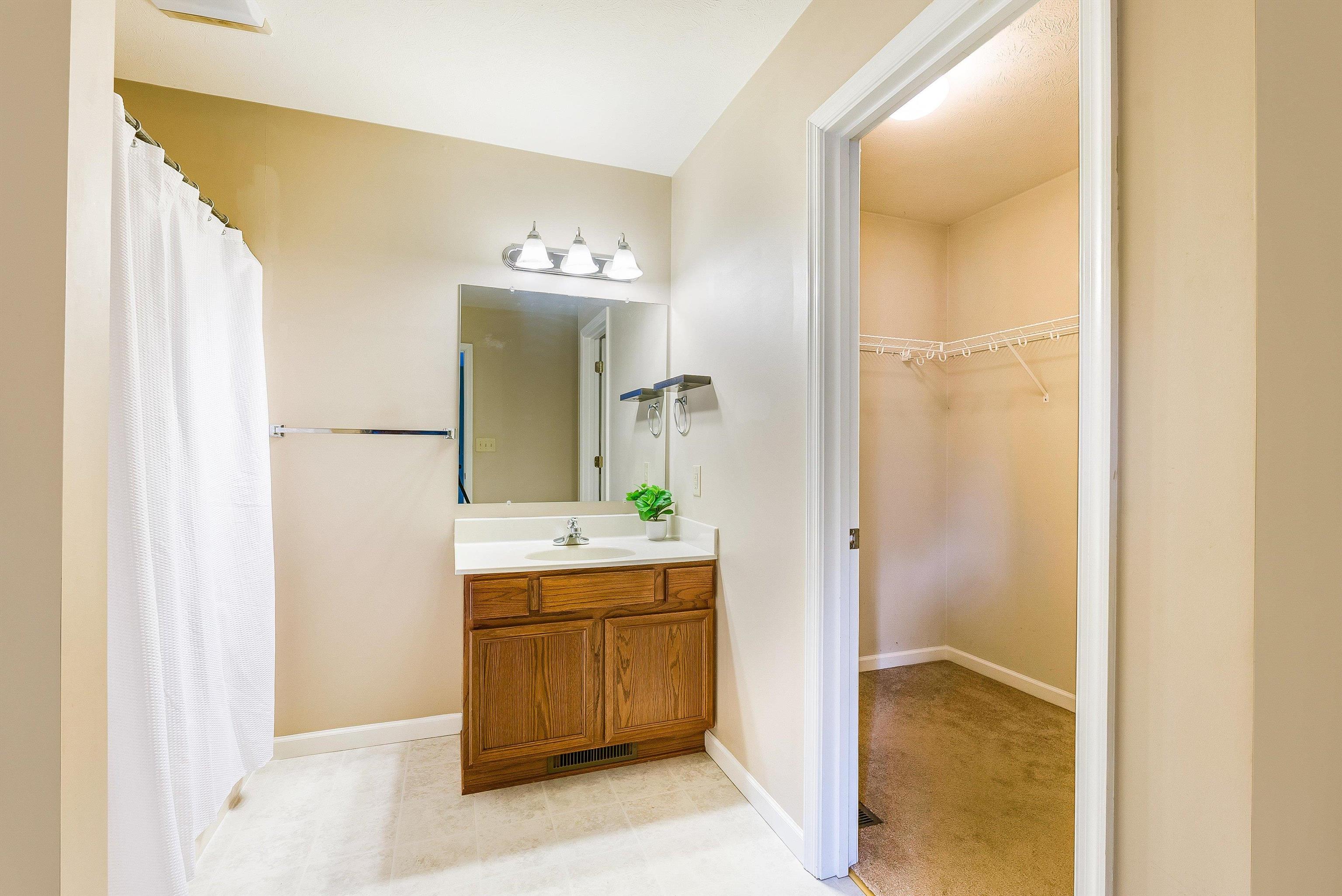 656 Edwardian Lane Waynesboro, VA 22980 - Photo 17 of 39 a bathroom with a sink and a mirror