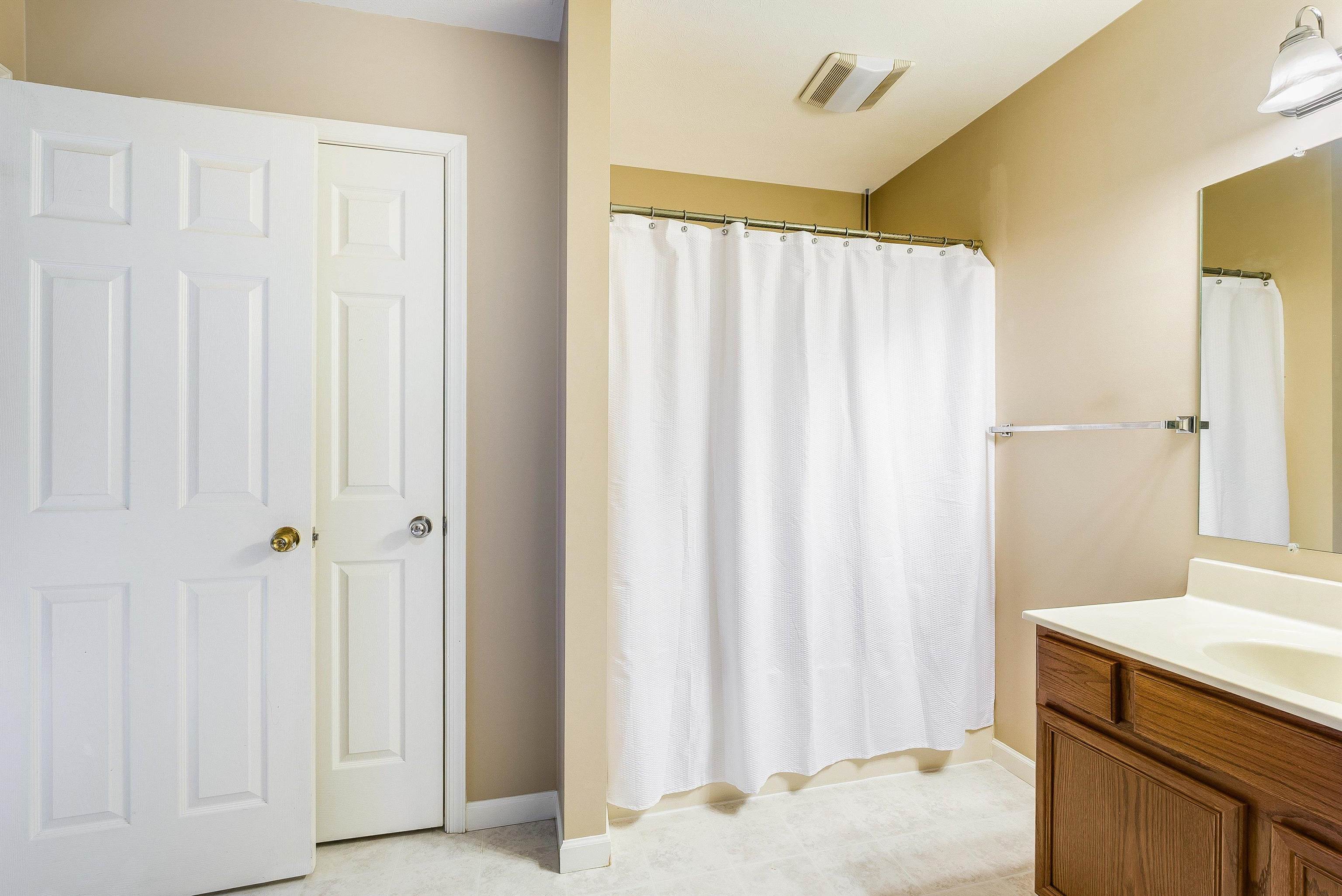 656 Edwardian Lane Waynesboro, VA 22980 - Photo 18 of 39 a view of a bathroom with a sink and a kitchen