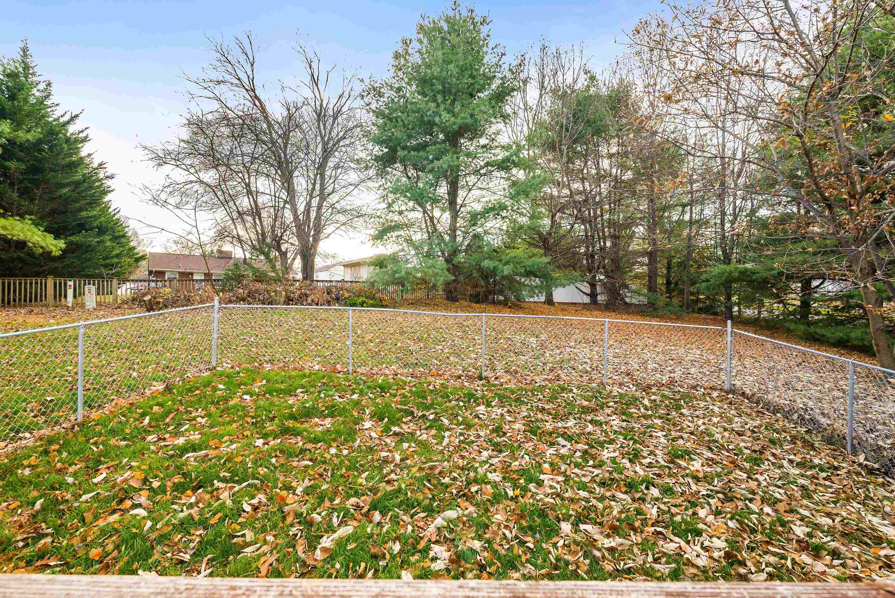 656 Edwardian Lane Waynesboro, VA 22980 - Photo 37 of 39 a view of a yard with wooden fence