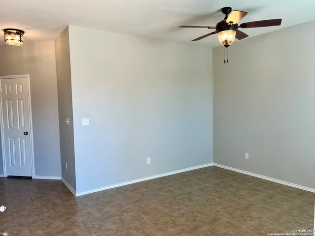a view of a room with a fan