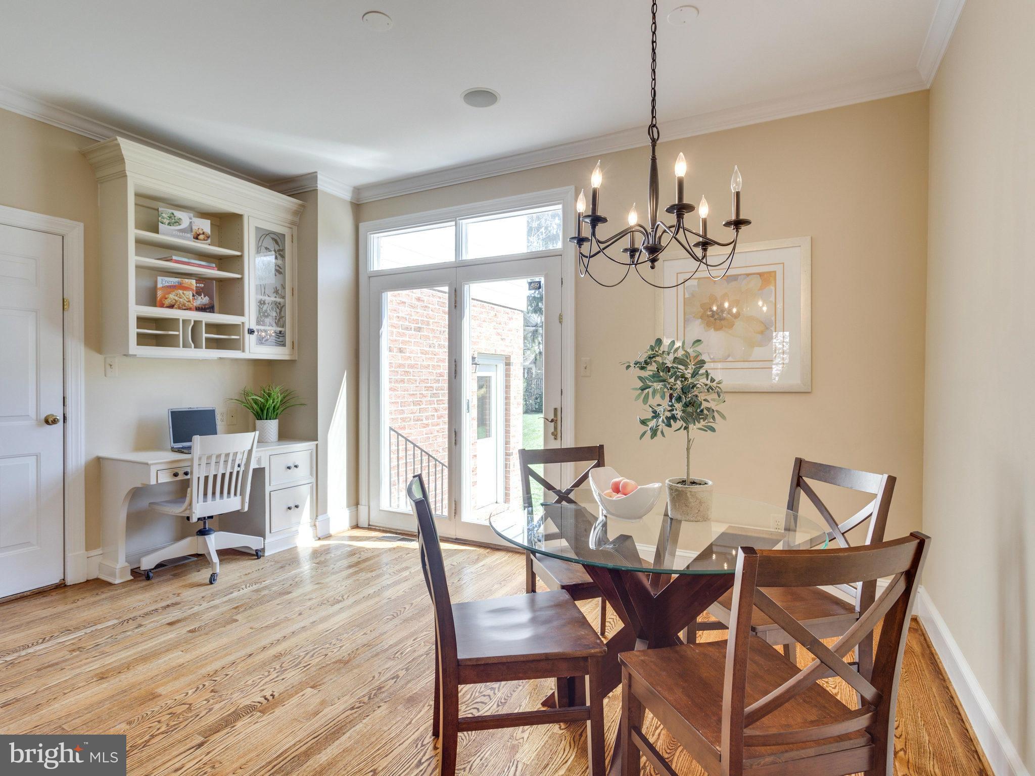 9423 Seven Locks Road Bethesda, MD 20817 - Photo 11 of 28 a view of a dining room with furniture window and wooden floor