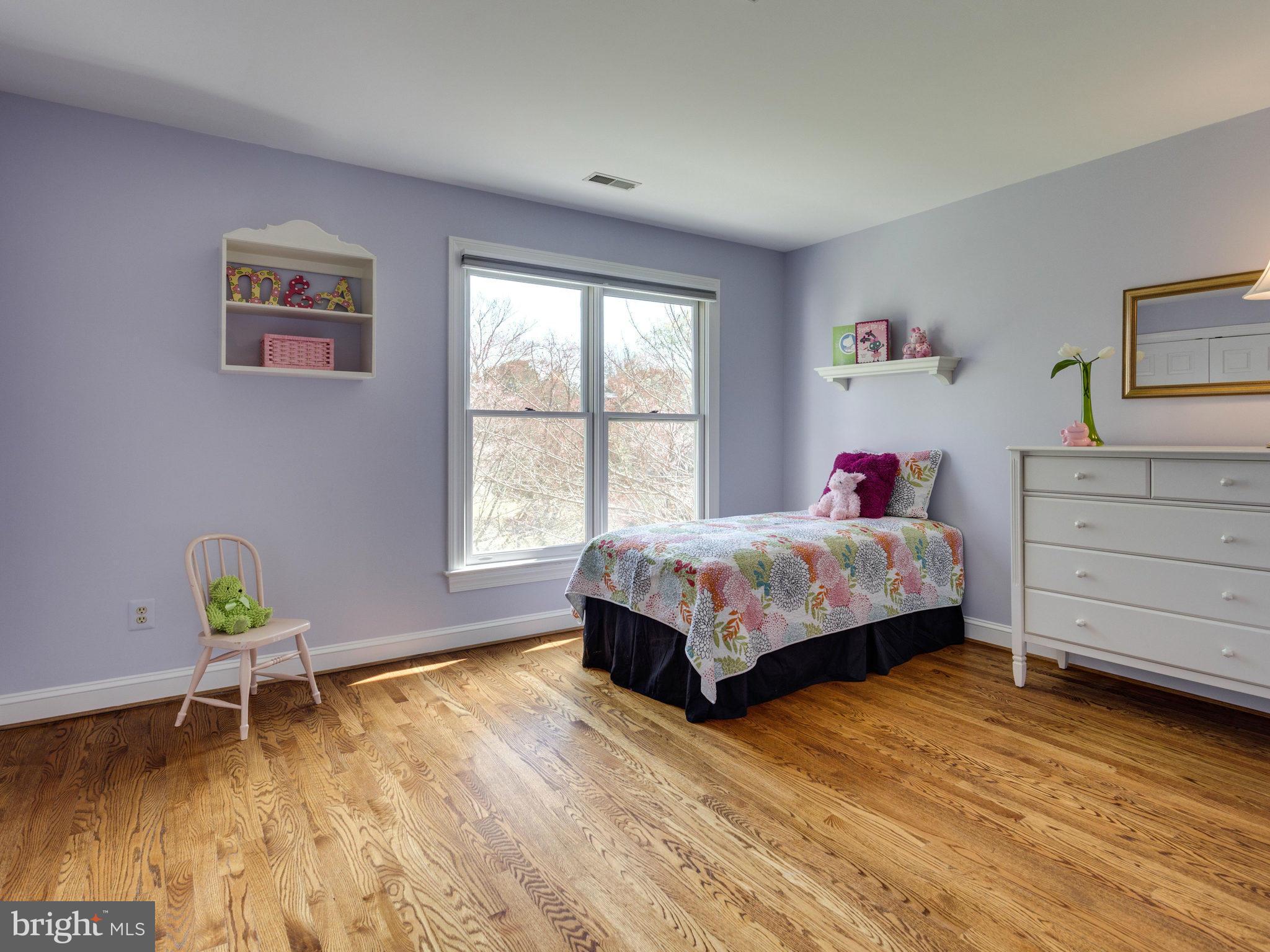 9423 Seven Locks Road Bethesda, MD 20817 - Photo 19 of 28 a bedroom with a bed and a window