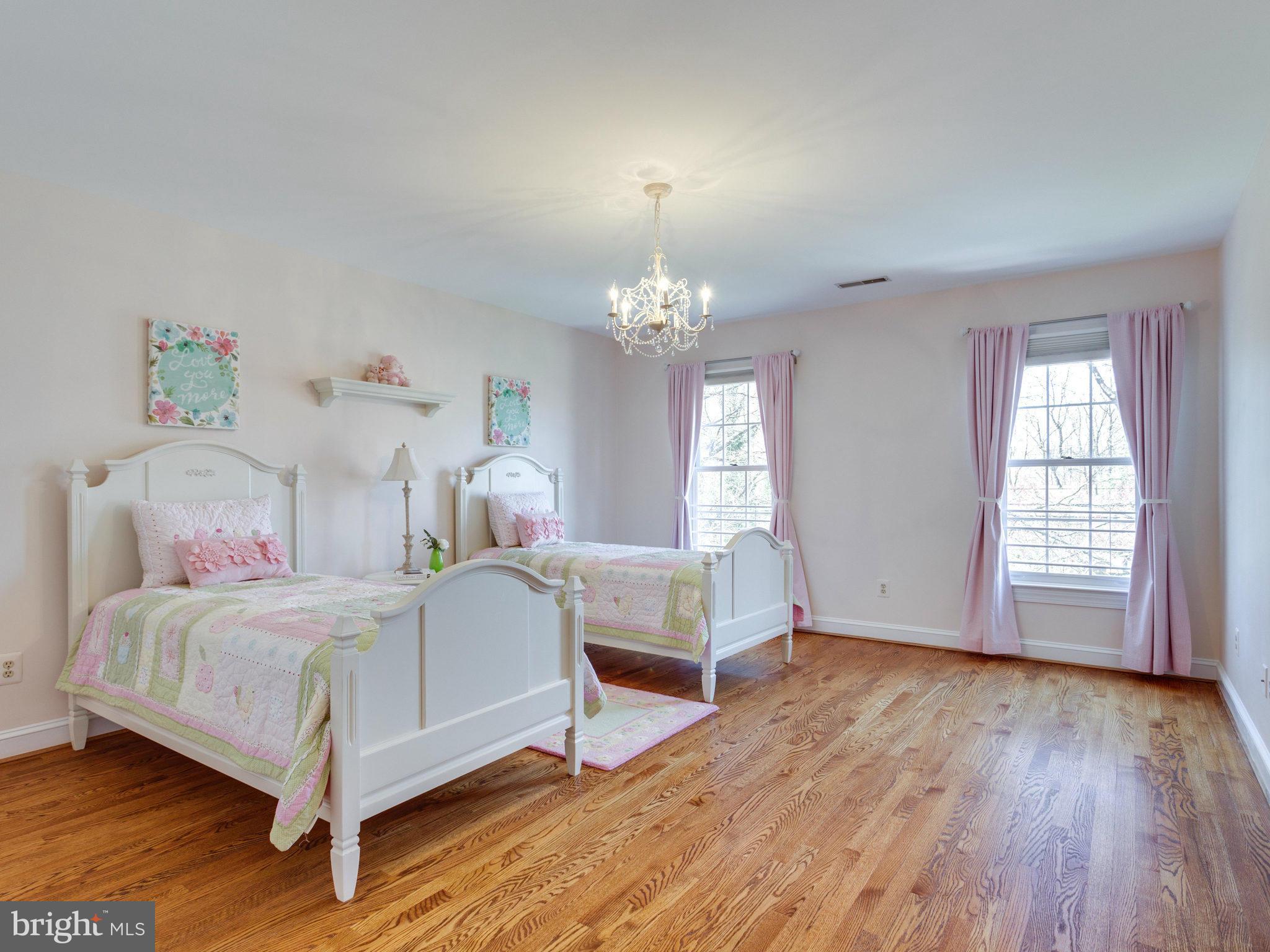 9423 Seven Locks Road Bethesda, MD 20817 - Photo 21 of 28 a bedroom with a bed and window