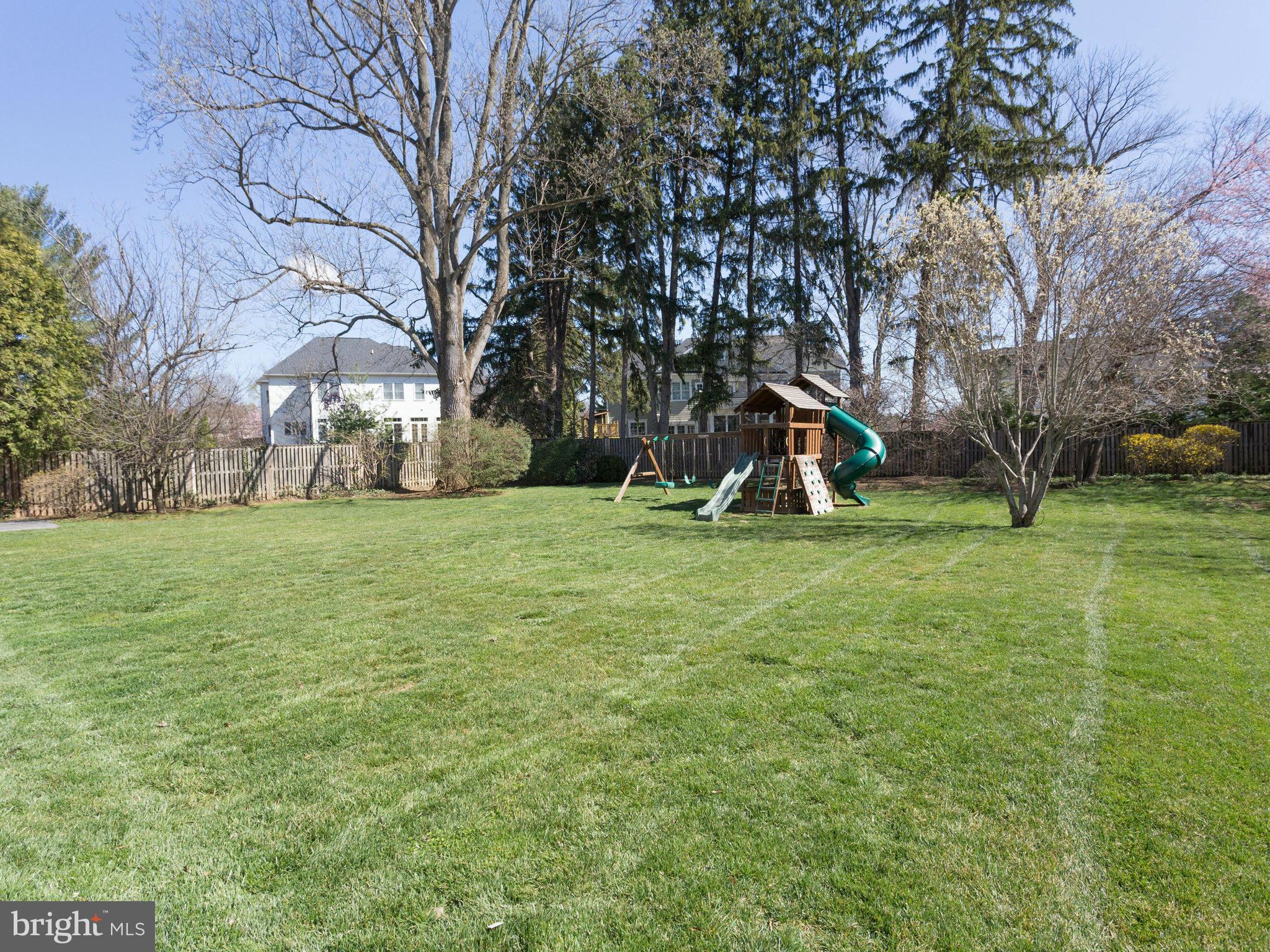 9423 Seven Locks Road Bethesda, MD 20817 - Photo 28 of 28 a view of a playground with a tree
