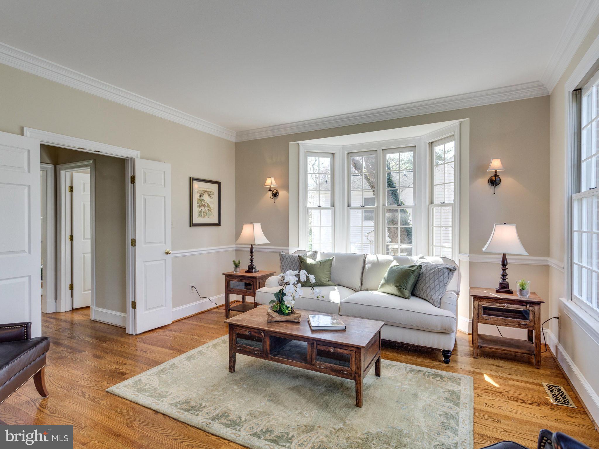 9423 Seven Locks Road Bethesda, MD 20817 - Photo 4 of 28 a living room with furniture and a window