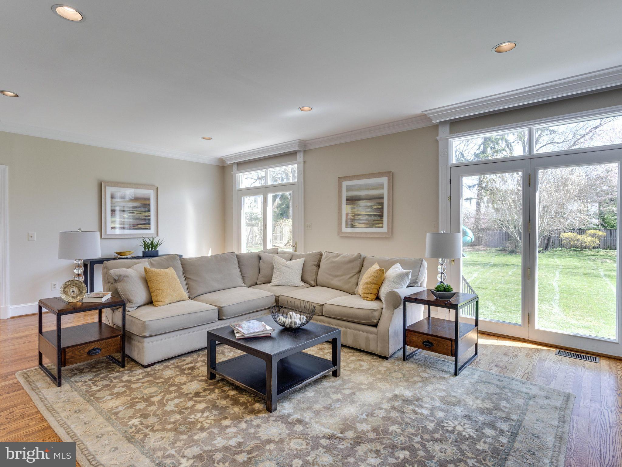 9423 Seven Locks Road Bethesda, MD 20817 - Photo 6 of 28 a living room with furniture and a large window
